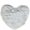 Heart-shaped fluffy pillow on a white background