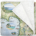 Map-themed blanket with scenic illustrations on a white background
