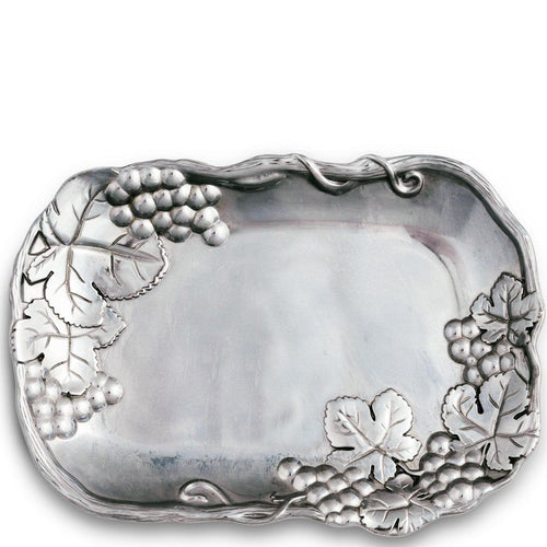 Decorative silver tray with leaf and grapevine designs on a white background