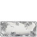 Decorative silver tray with leaf and grapevine patterns on a white background