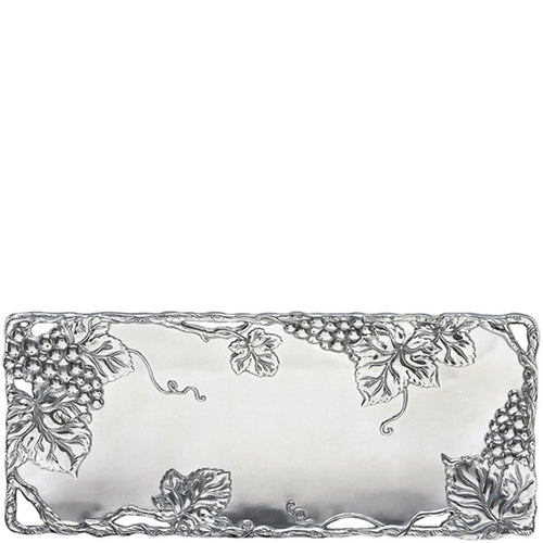 Decorative silver tray with leaf and grapevine patterns on a white background