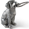 Metallic dog-shaped bottle opener on a white background