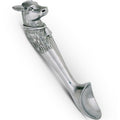 Silver cow head spoon on a white background