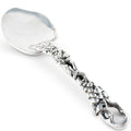 Decorative silver spoon on a white background