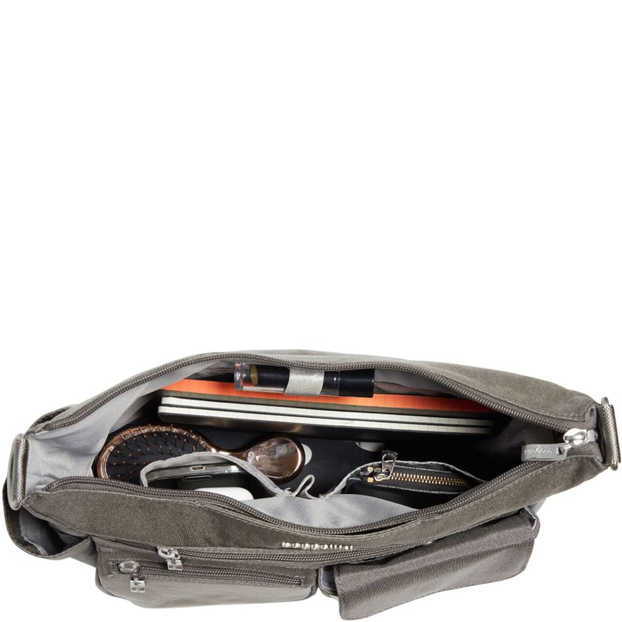 Open gray bag with compartments and items on a white background