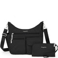 Black handbag with matching wallet on a white background