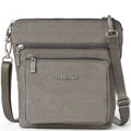 Gray crossbody bag with multiple zippers and 'baggallini' branding on a white background