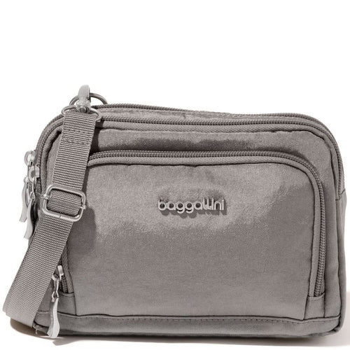 Gray crossbody bag with 'baggallini' logo on a white background