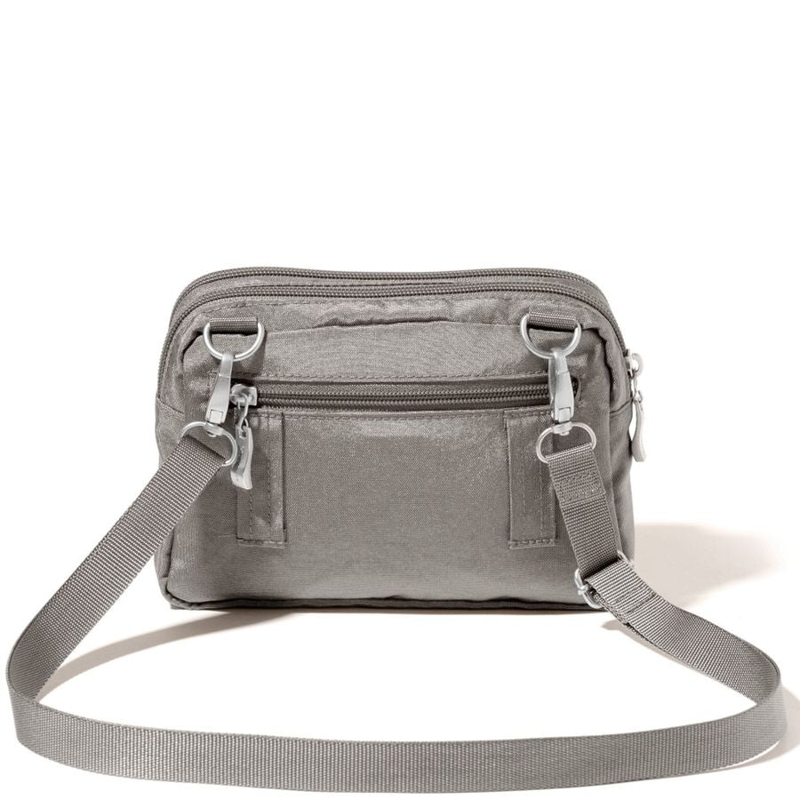 Gray crossbody bag with multiple pockets and zippers on a white background