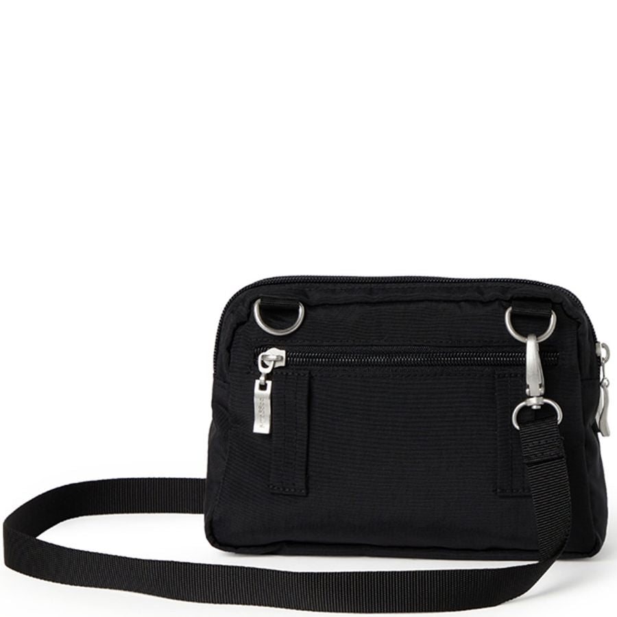 Black crossbody bag with silver zippers on a white background