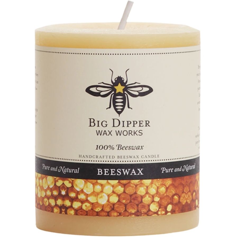 Beeswax candle with 'Big Dipper Wax Works' label on a white background