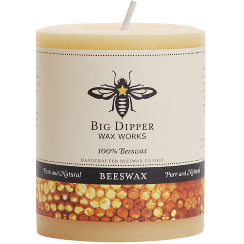 Beeswax candle with 'Big Dipper Wax Works' label on a white background