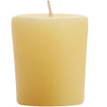 Yellow candle on a white background