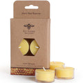 Beeswax tea lights with packaging from Big Dipper Wax Works on a white background