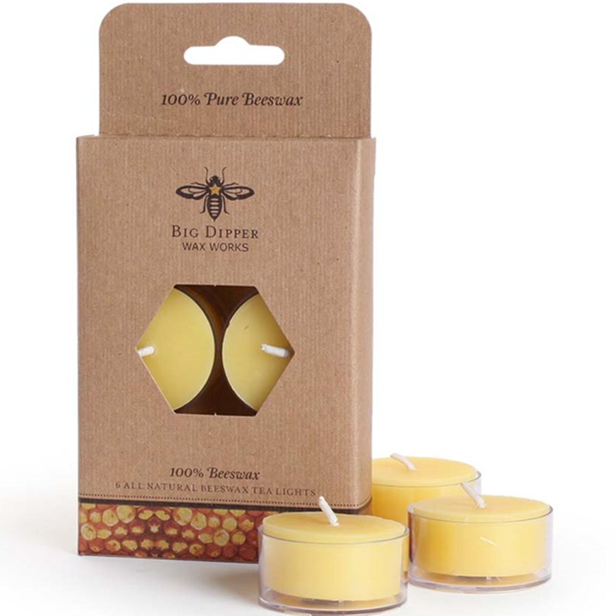 Beeswax tea lights with packaging from Big Dipper Wax Works on a white background