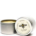 Beeswax candle in a metal tin with 'Big Dipper Wax Works' branding on a white background