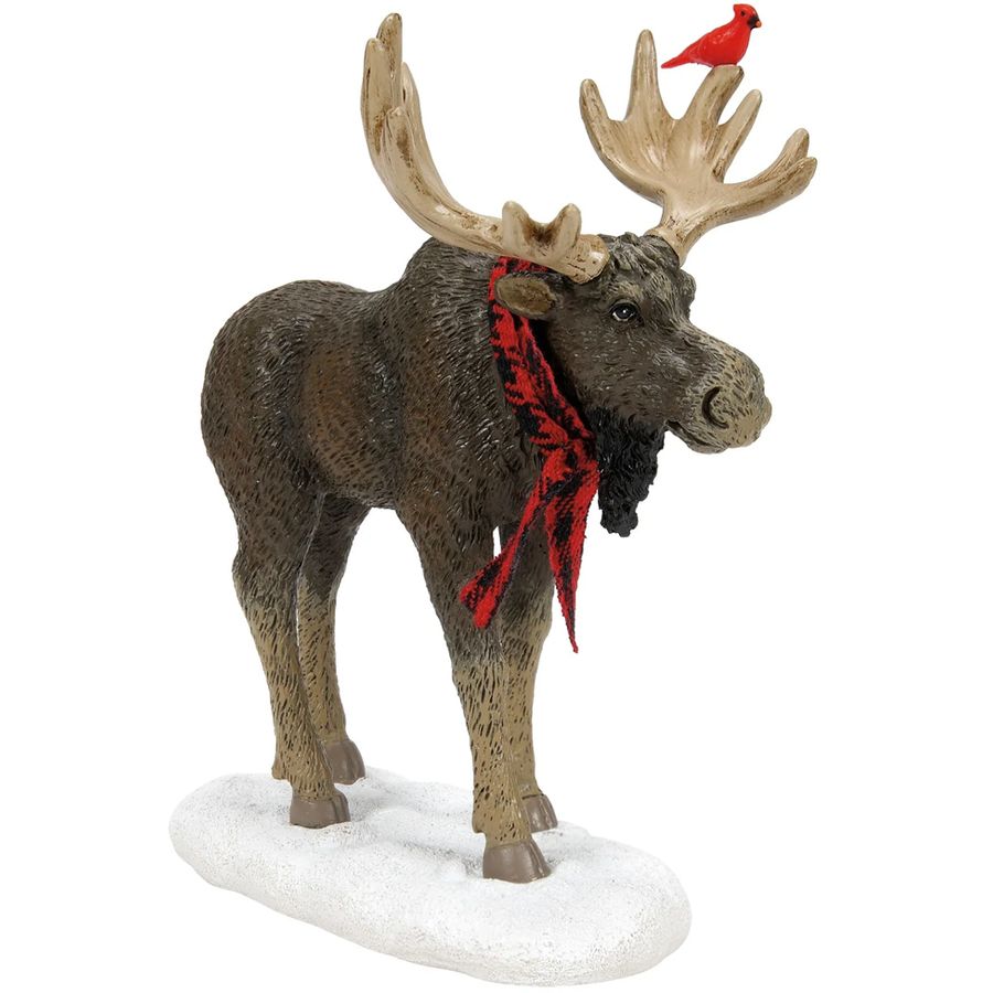 Moose figurine with a red scarf and cardinal on a white background