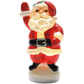 Decorative figurine of a waving Santa Claus on a white background