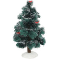 Small artificial Christmas tree with red berries on a white background