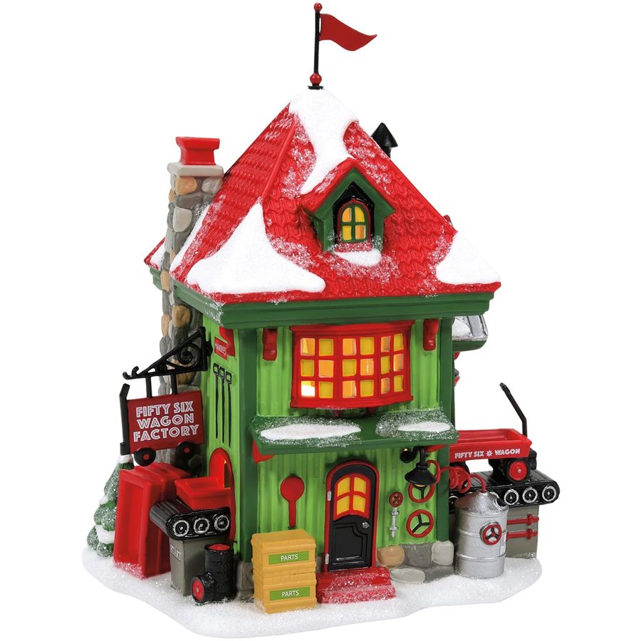 Christmas-themed toy factory set with red and green colors on a white background