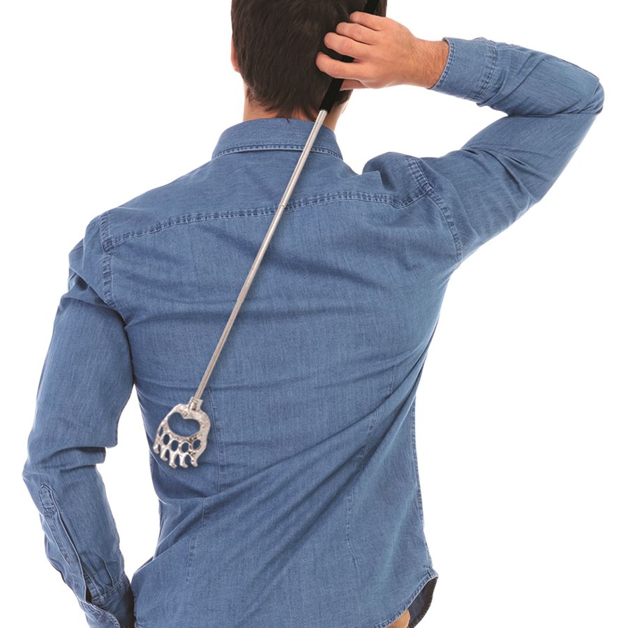 Person wearing a blue denim shirt using a backscratcher on a white background