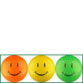 Three smiley face golf balls in orange, yellow, and green on a white background.