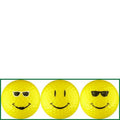 Three yellow golf balls with smiley face designs on a white background
