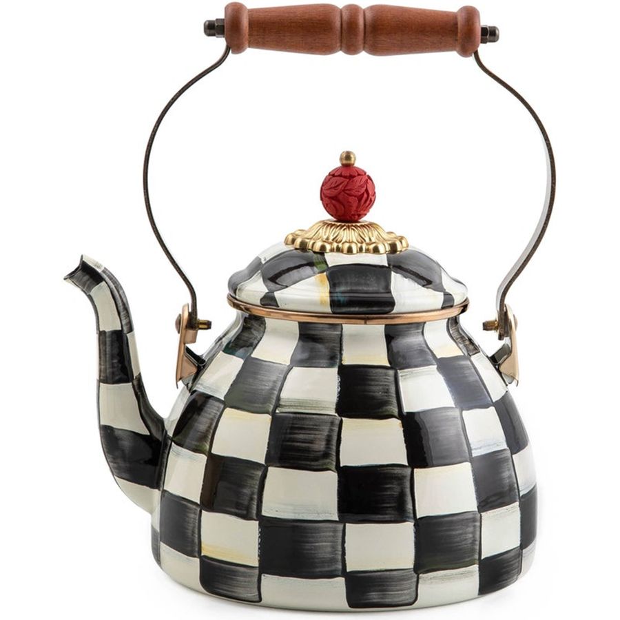 Decorative teapot with checkered pattern and wooden handle on a white background
