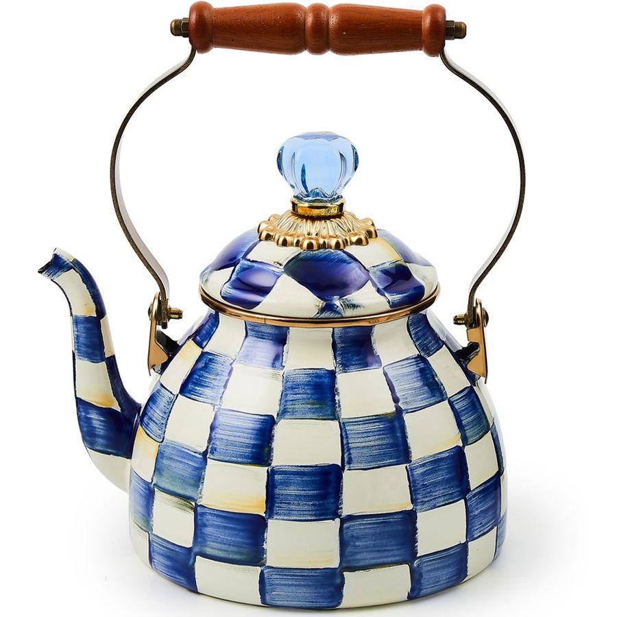 Decorative teapot with blue and white checkered pattern on a white background