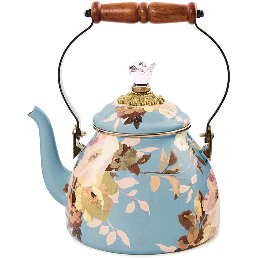 Floral-patterned teapot with wooden handle on a white background