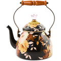 Floral-patterned teapot with wooden handle on a white background