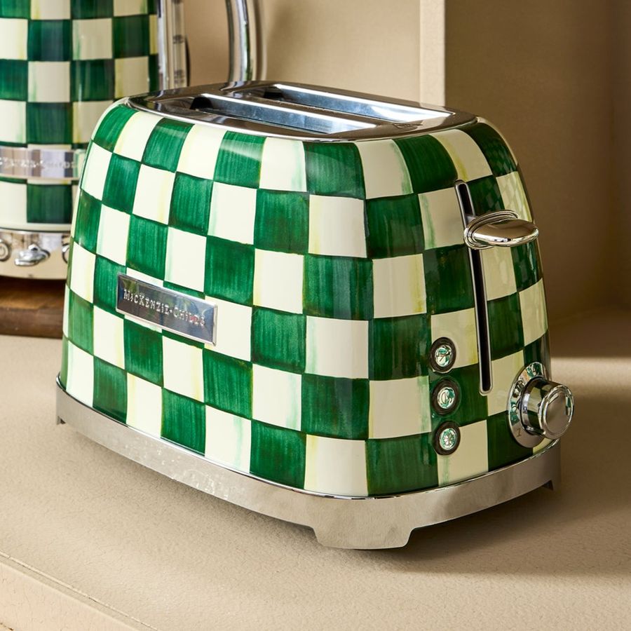 Green and white checkered toaster on a kitchen counter