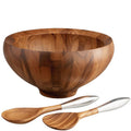 Wooden salad bowl with two wooden spoons on a white background