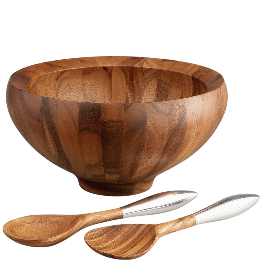 Wooden salad bowl with two wooden spoons on a white background