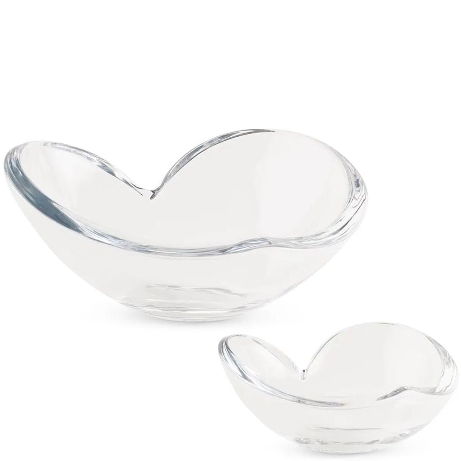 Two clear glass heart-shaped bowls on a white background