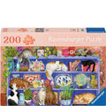 Ravensburger puzzle box with cats on a shelf design