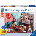 Ravensburger puzzle box with puppies around a dresser
