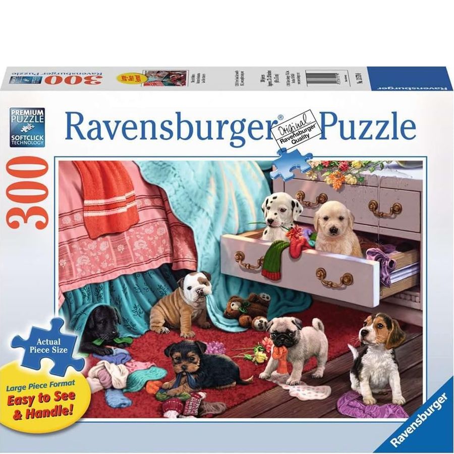 Ravensburger puzzle box with puppies around a dresser