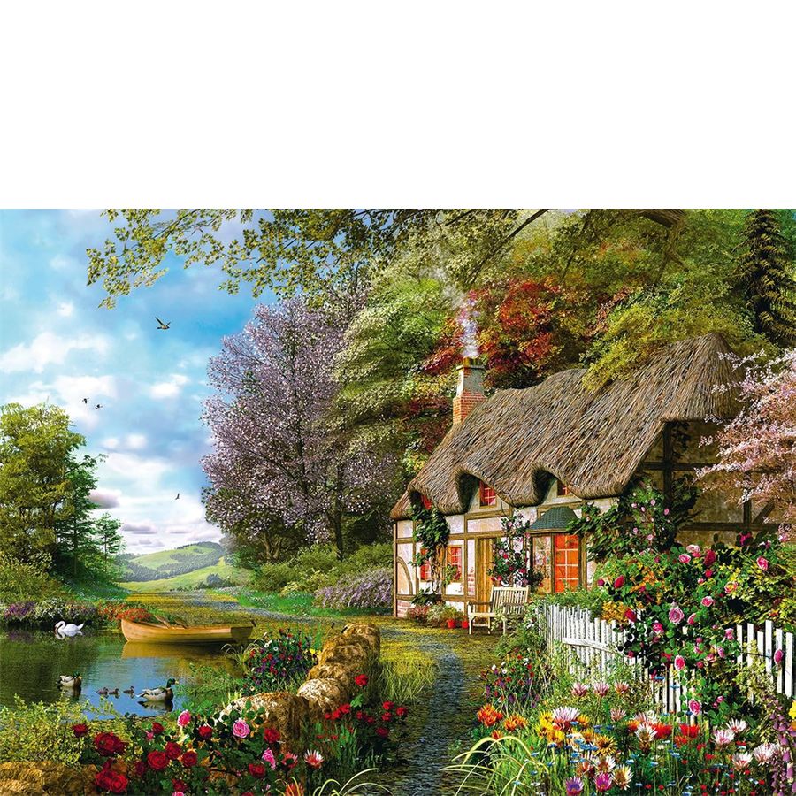 Cottage by a lake with flowers and trees