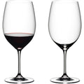 Reidel red wine glass with red wine, empty Reidel wine glass on white background.
