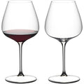 Reidel red wine glasses, one filled with red wine, clear glass, stem design.