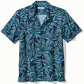 Blue leaf-patterned shirt on a white background