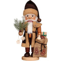 Wooden Santa Claus figurine holding a bag of gifts and a branch on a white background