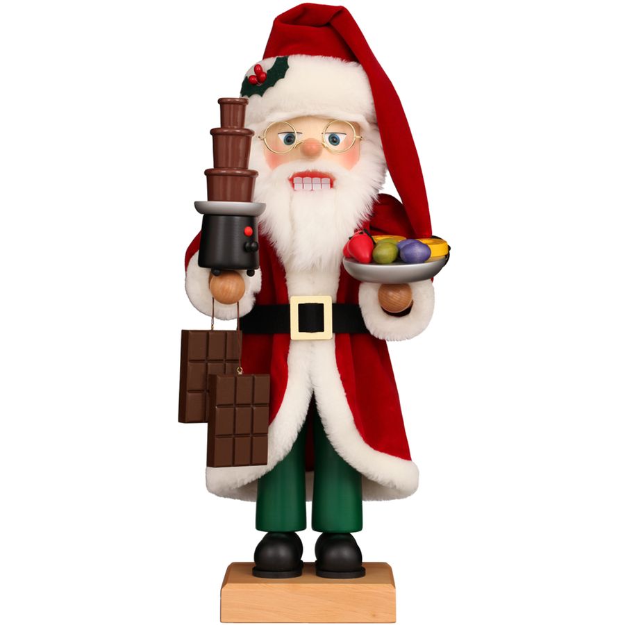Santa Claus figurine holding a tray of chocolates and a coffee pot on a white background
