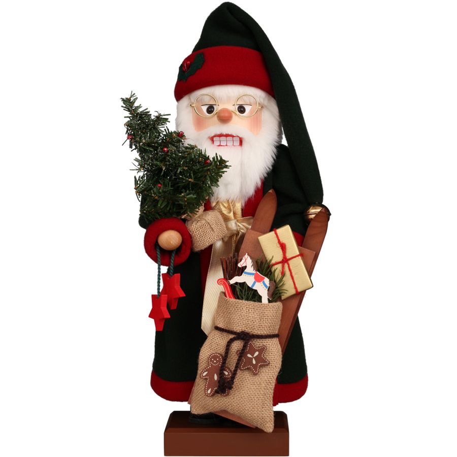 Decorative figure of a Santa Claus holding a tree and gifts on a white background
