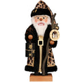 Decorative figure of a Santa Claus with leopard print elements on a white background