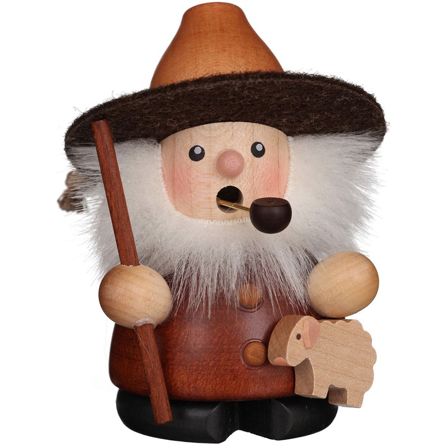 Wooden gnome figurine with a hat, pipe, and shepherd's crook on a white background