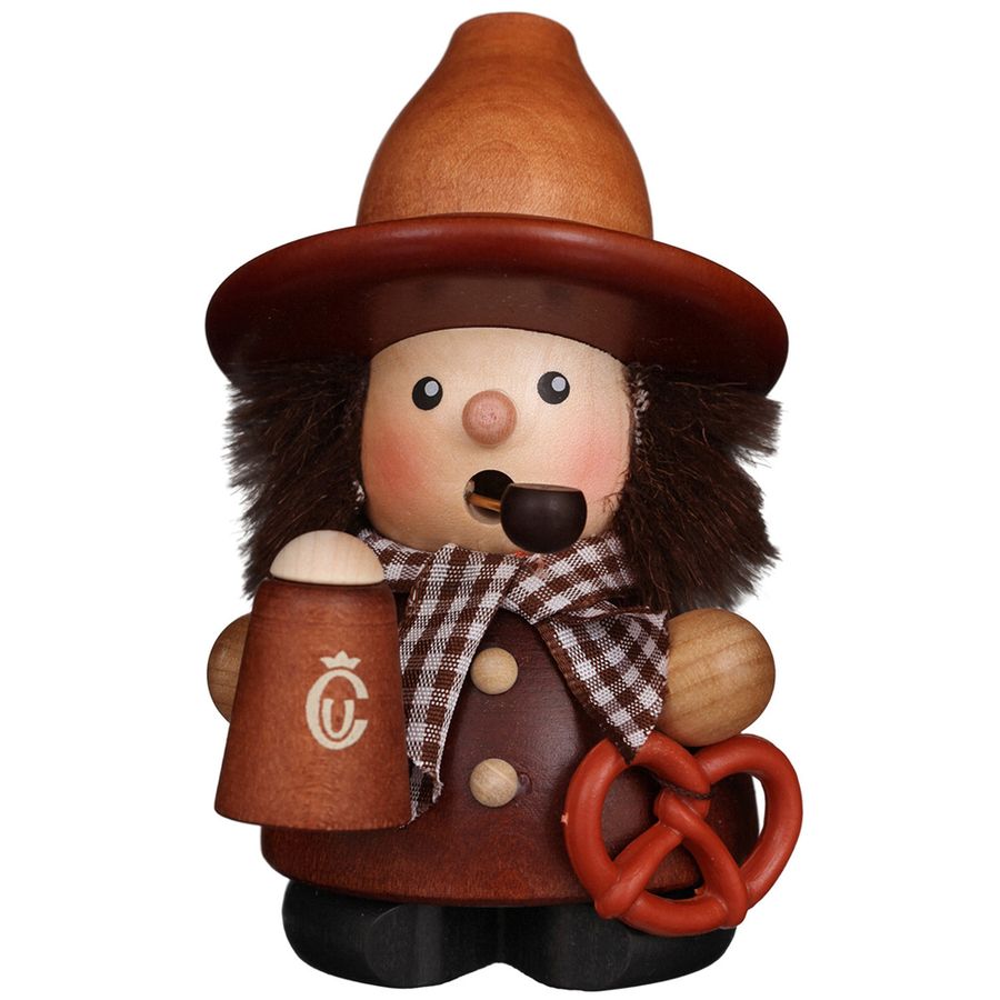 Decorative figurine of a character with a brown hat, holding a mug and pretzel, on a white background.