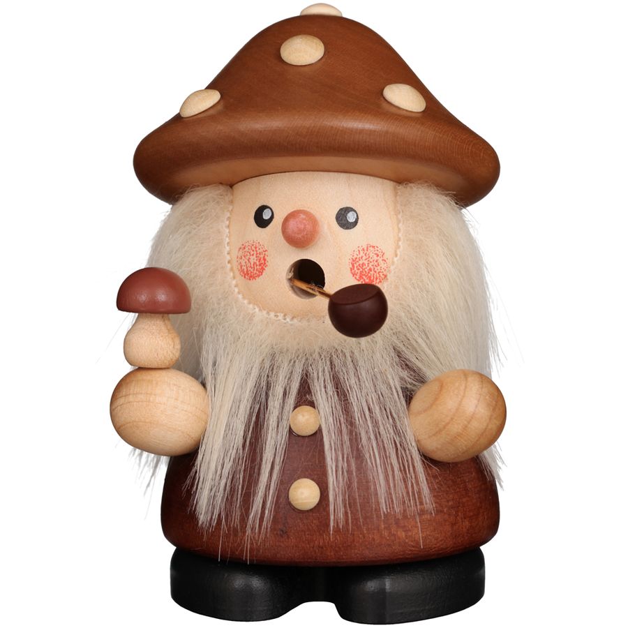 Wooden gnome figurine with a mushroom hat on a white background