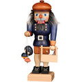 Wooden nutcracker figurine with a white background